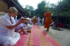 offering alms food for the monks